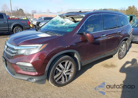 2017 Honda Pilot Touring z USA, uszkodzony, nr VIN 5FNYF6H92HB042044